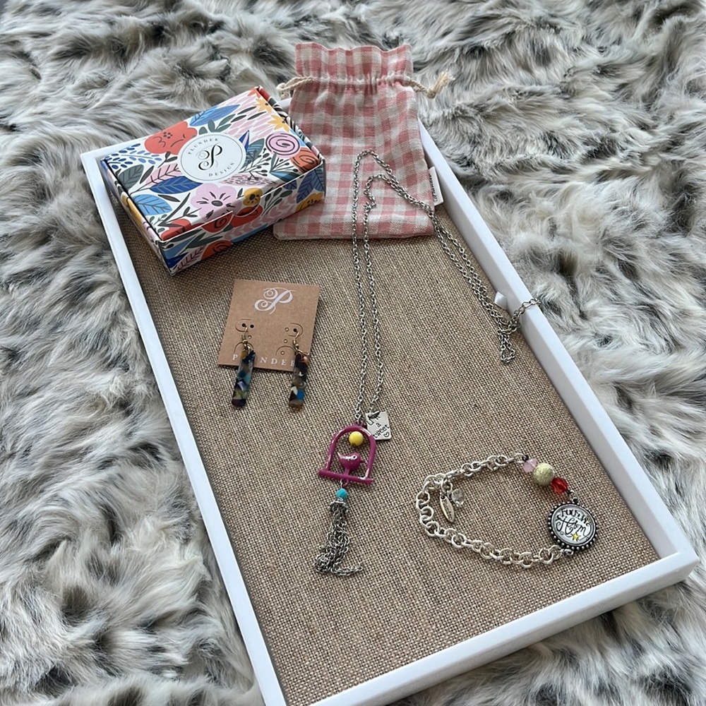 Plunder a lot of earrings bracelet and necklace The necklace is a charm necklace